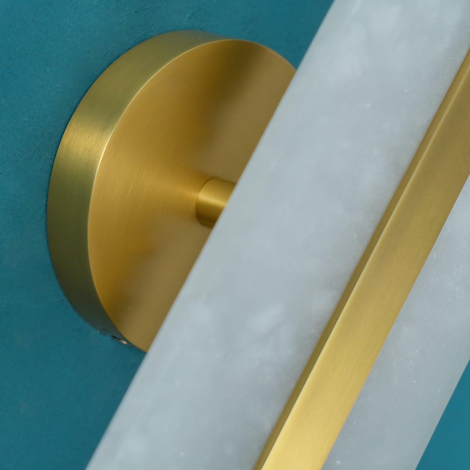 Close view of circular Brass backplate and shade