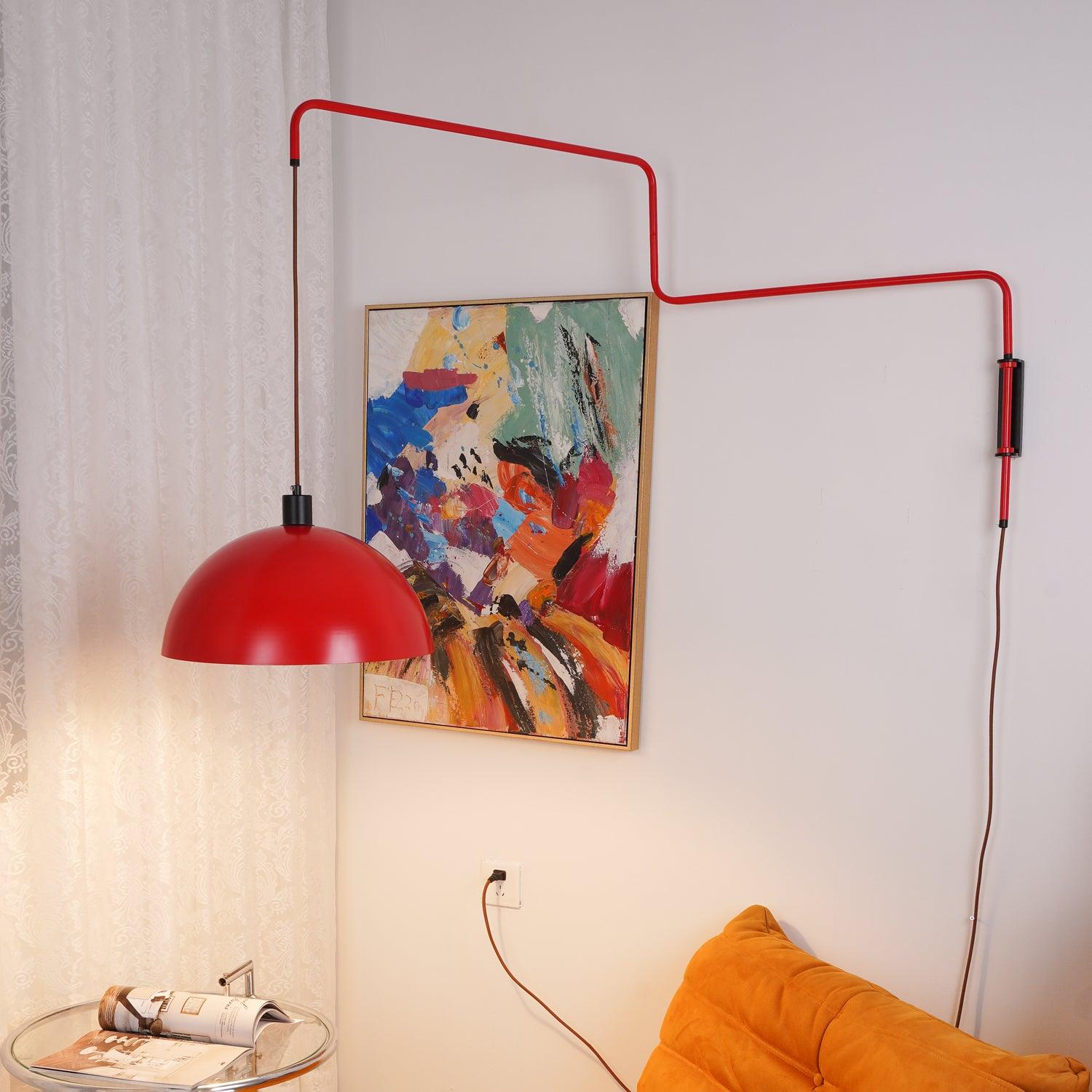 Long-arm Elio wall lamp beside a small side table