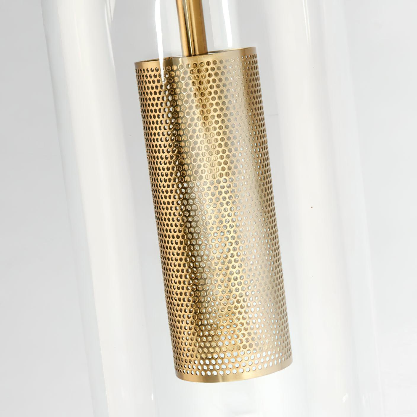 Unlit Gold Vadim shade close-up, clear rounded glass around perforated cylinder and bulb visible behind mesh