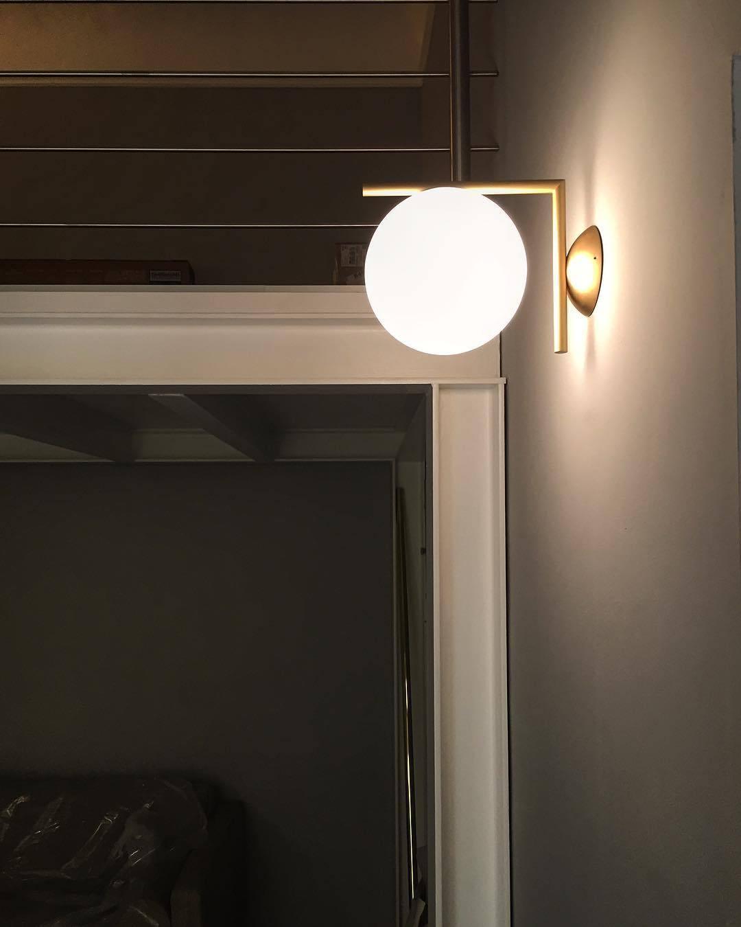 Opal glass globe wall light