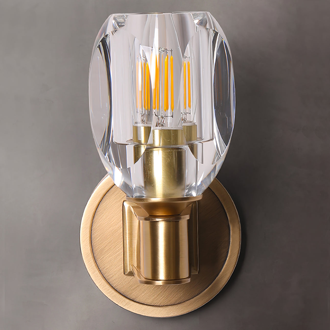 Unlit faceted shade with visible filament-style bulb