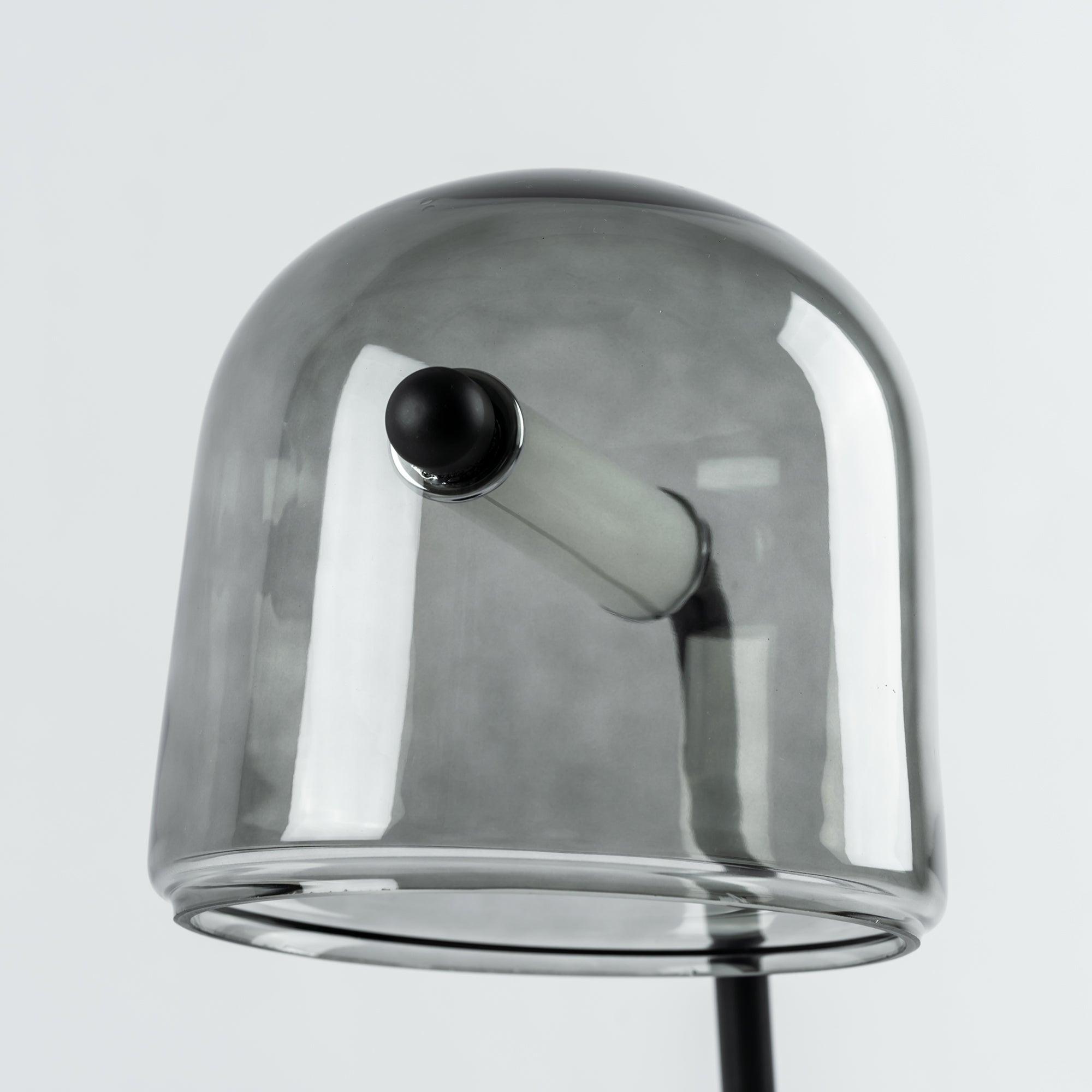 Mona unlit tube and support visible through rounded glass