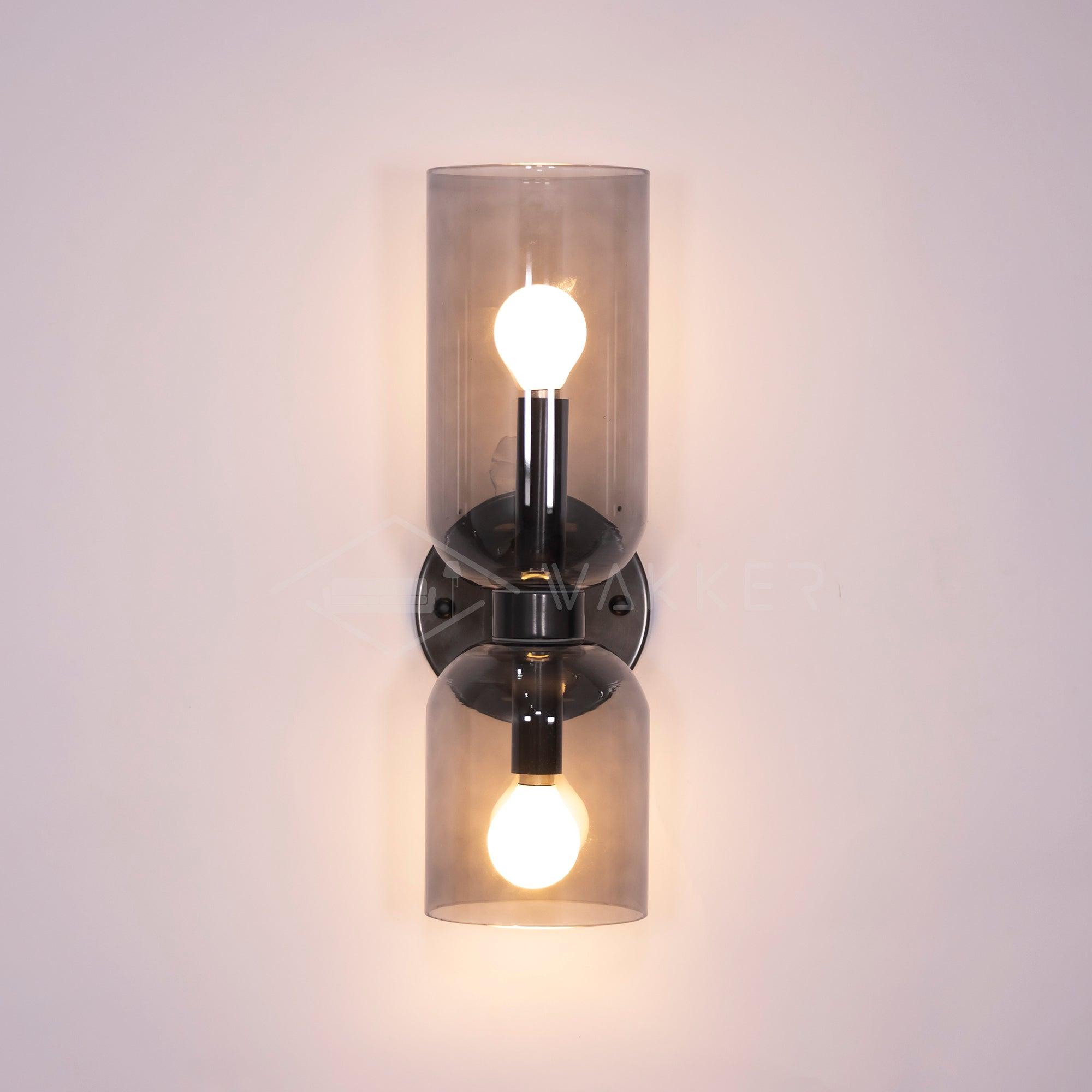 Edie glass wall lamp with unequal upper and lower cylinders