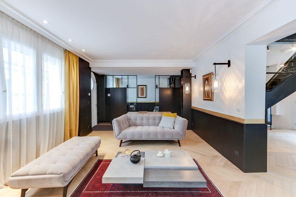 Several glass wall fixtures in a living room