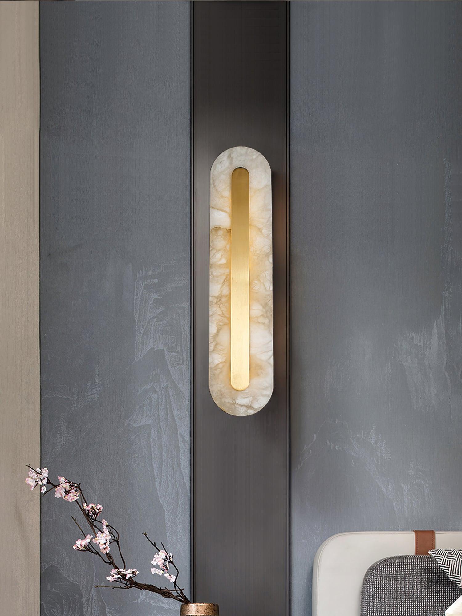 Veined stone panel against a grey wall