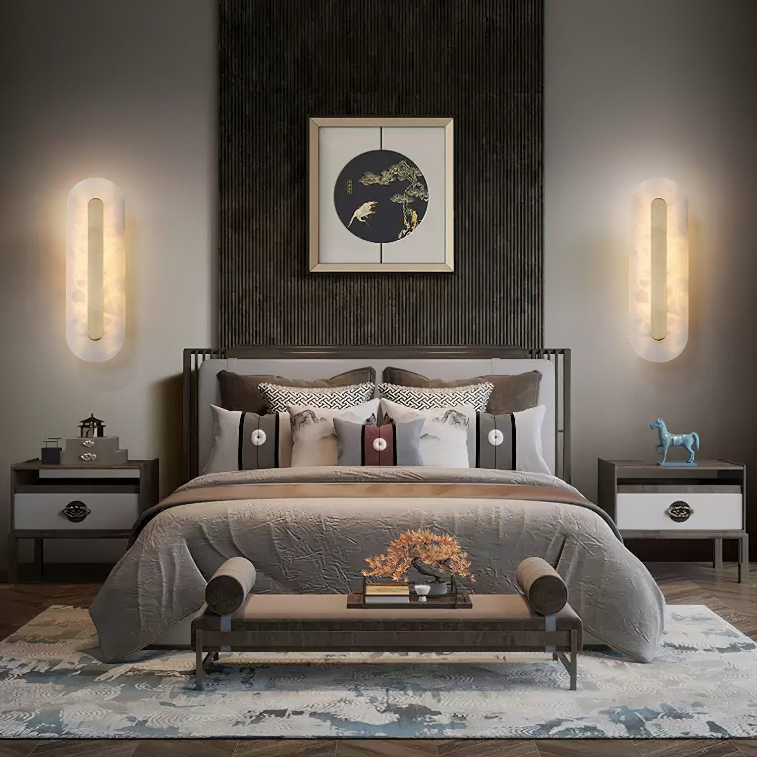 Pair of rounded fixtures flanking a bed
