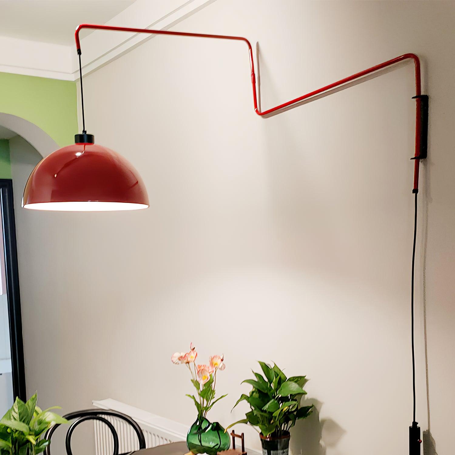 Long wall arm with hanging cord and black counterweight