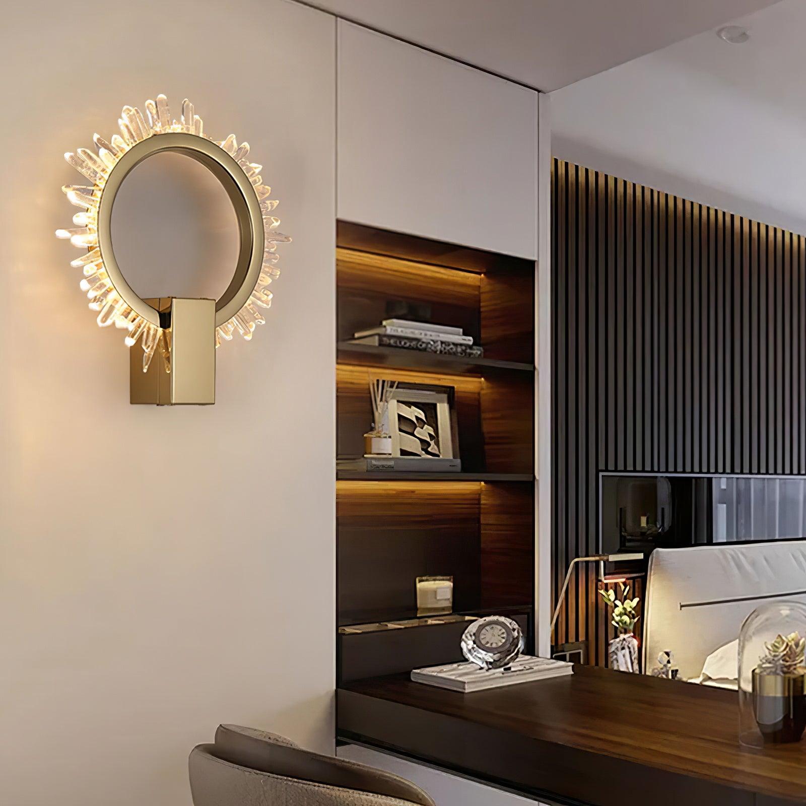 Gold crystal ring wall light beside a dressing desk, mirror and illuminated shelves