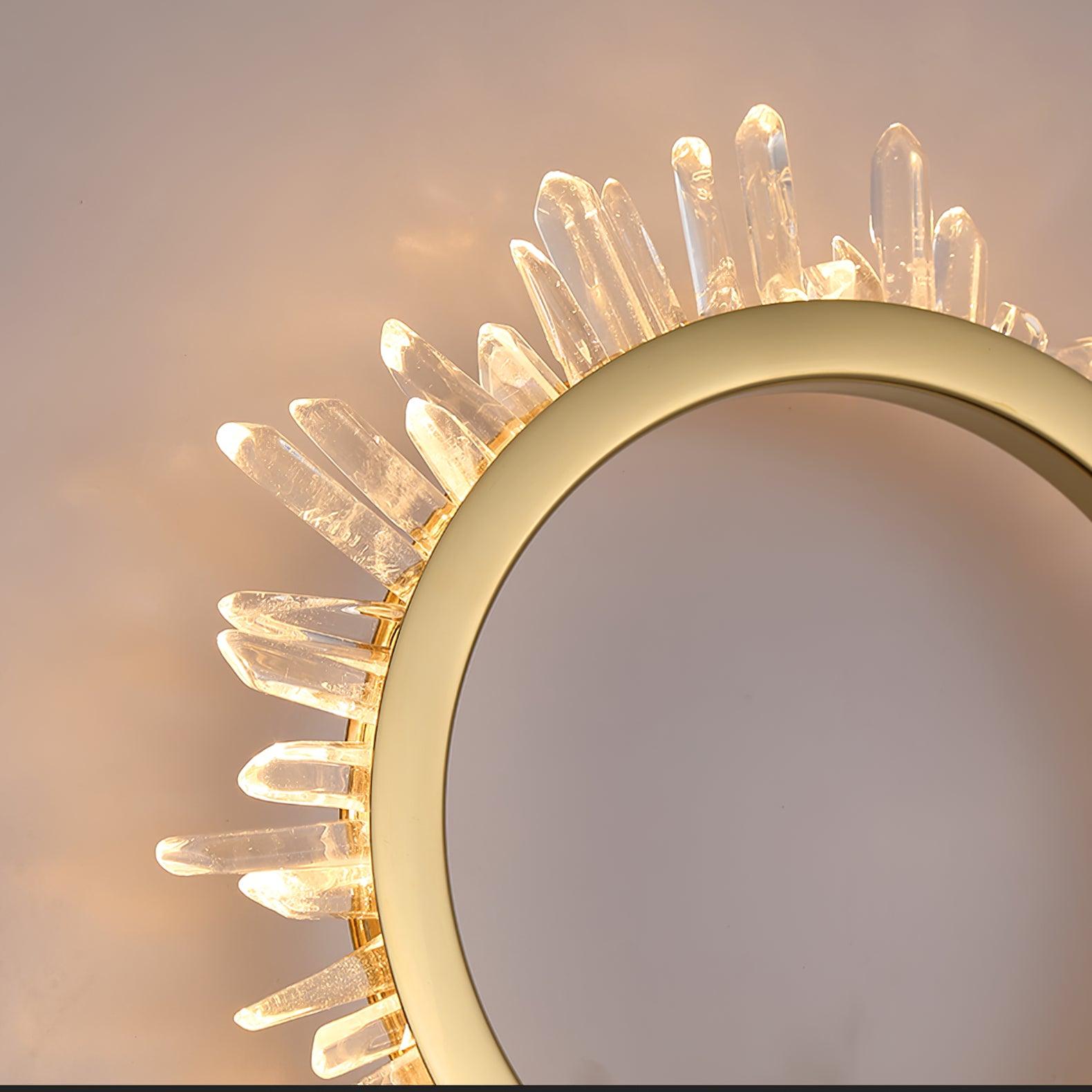 Close-up of the upper-left gold arc and illuminated clear crystal tips