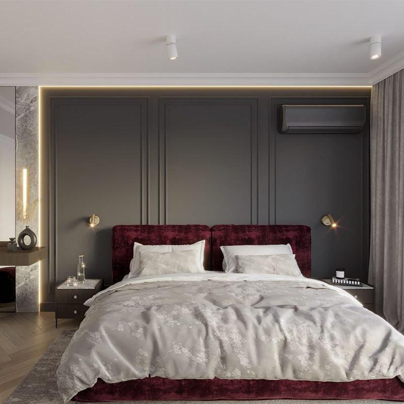 Reading wall lights in a furnished bedroom