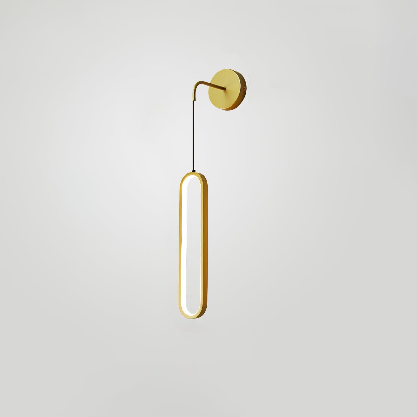 Brass-finish wall plate and short arm above a narrow hanging oval ring