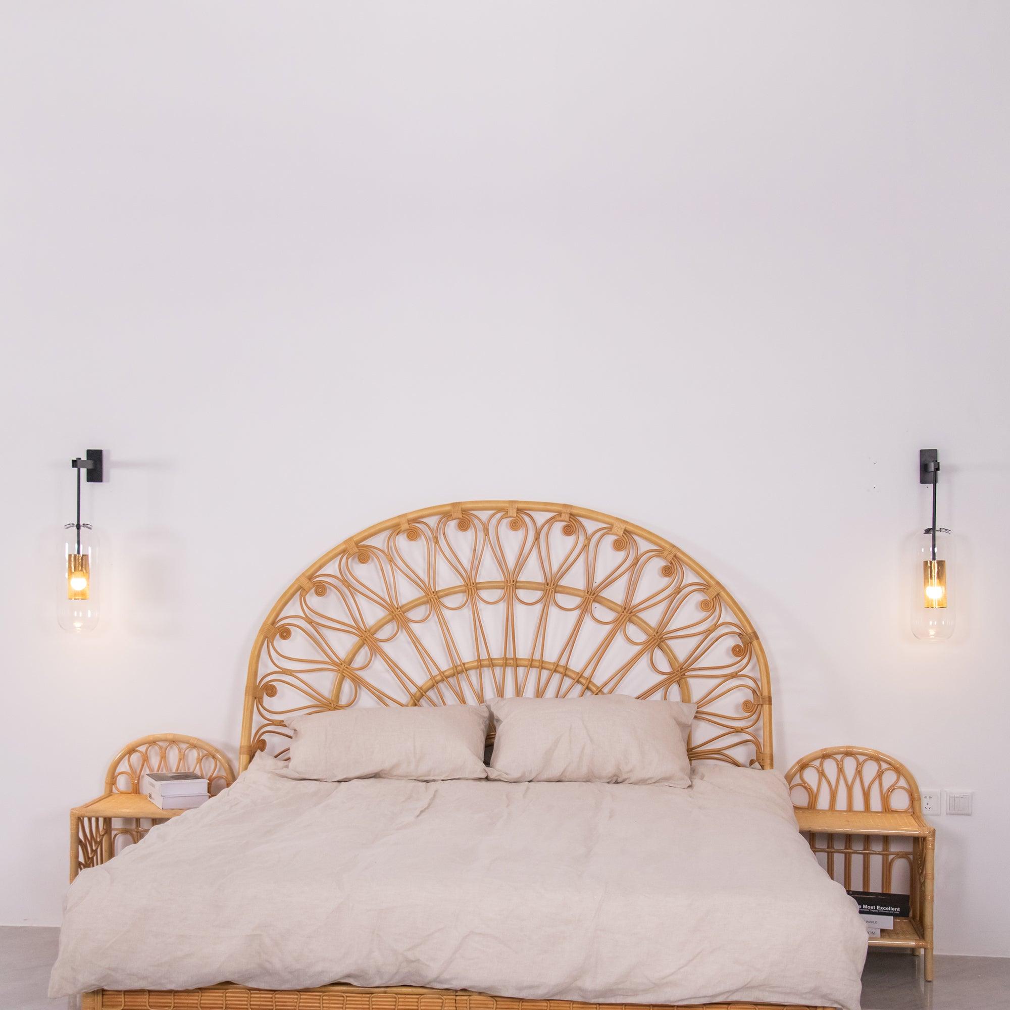 Two wall fixtures on either side of a bed