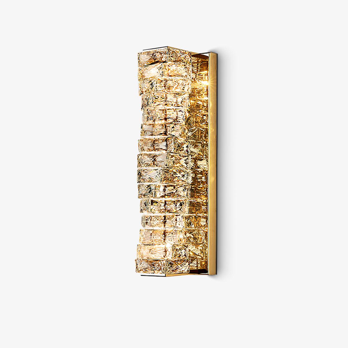 Gold layered crystal fixture on a pale background