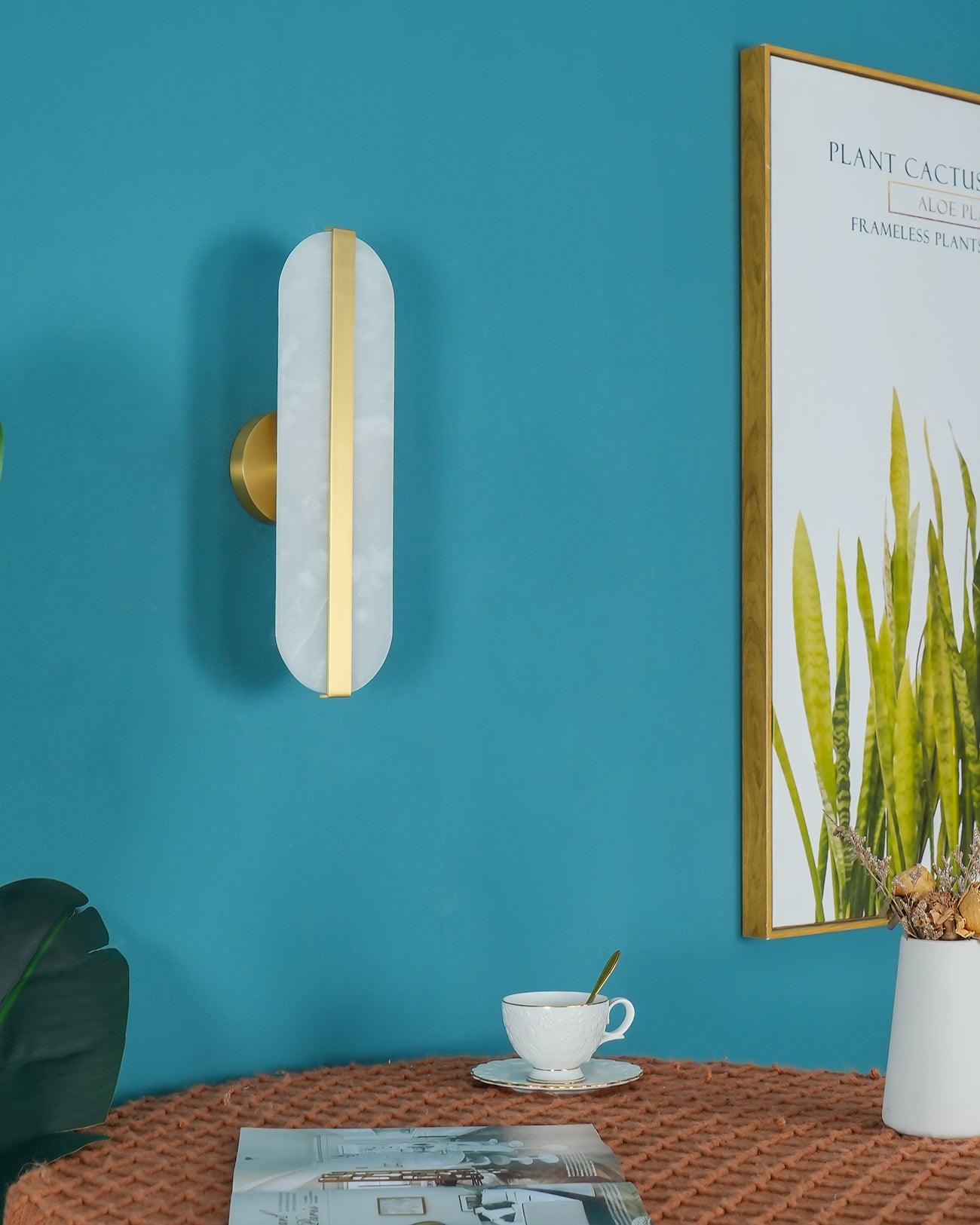Unlit White sconce on a blue wall