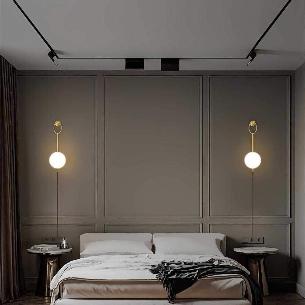 Pair of Ballon wall lights on either side of a bed