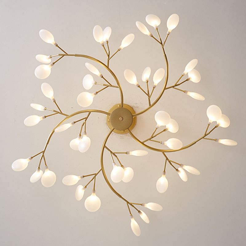 Olivia gold chandelier viewed from below with radial branches and oval shades