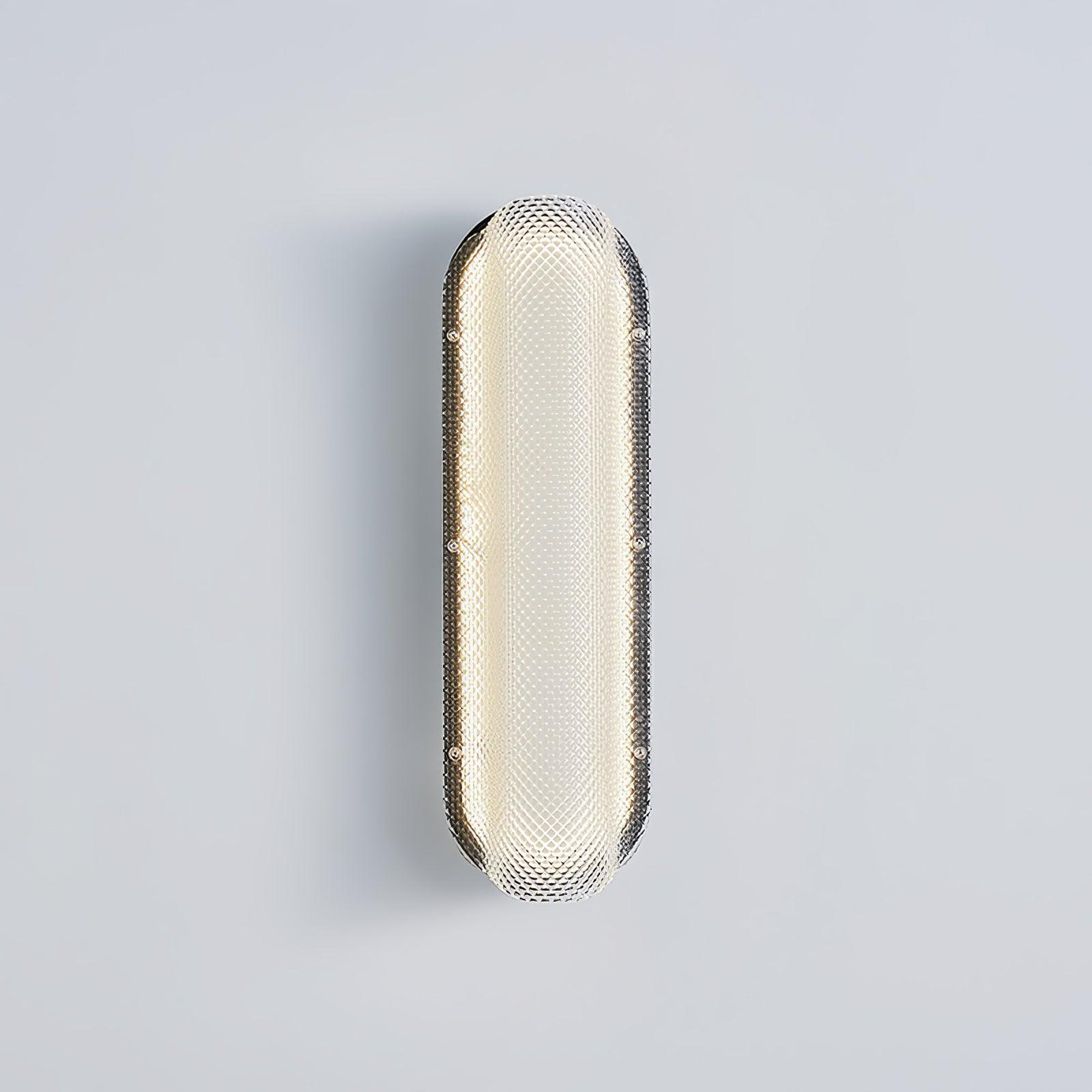 Frontal Vale wall light with a glowing textured lens, rounded ends and black plate on grey