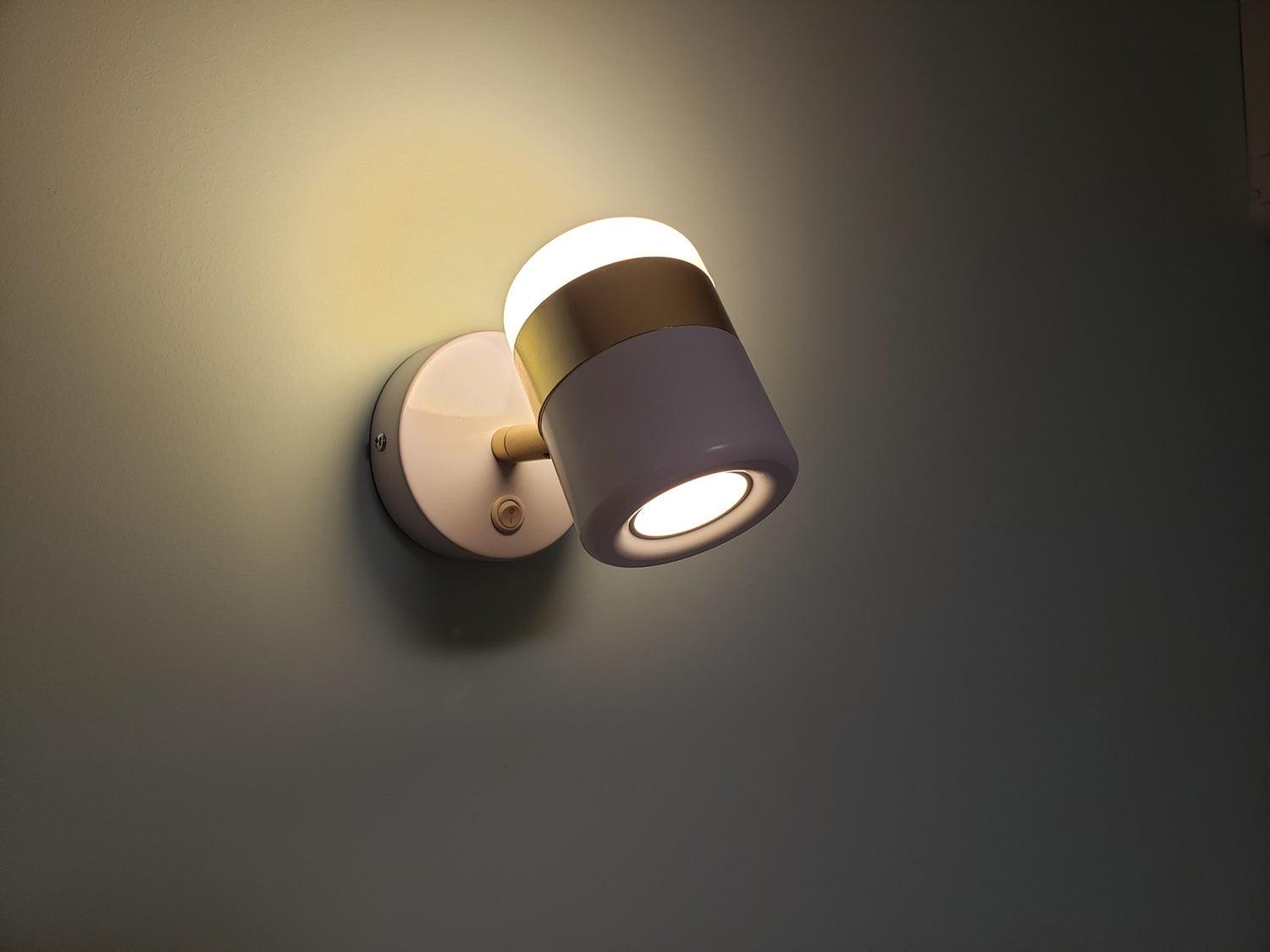 Adjustable cylindrical LED wall light