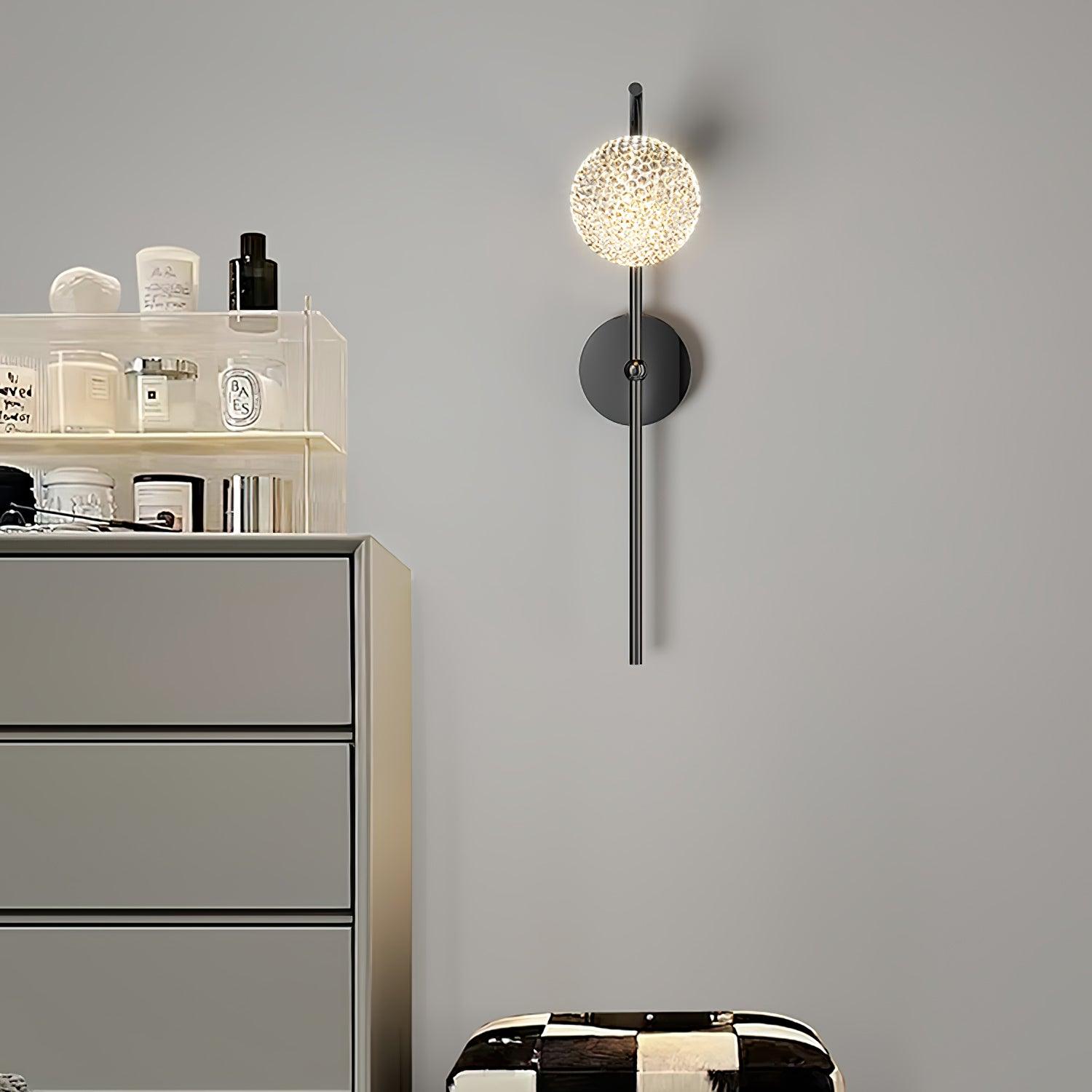 Black Ksovv lamp above a drawer cabinet