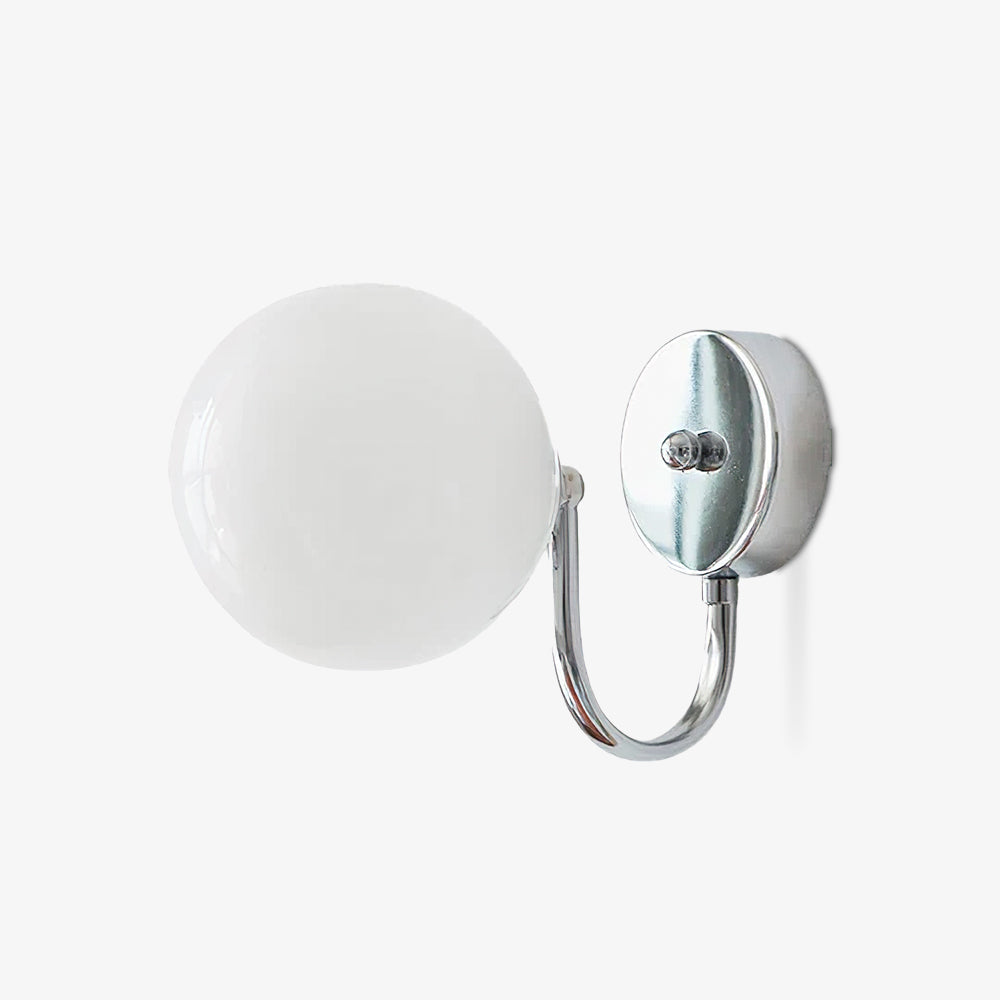 Small isolated Staggered wall fixture with white globe at left, round plate at right and curved arm below