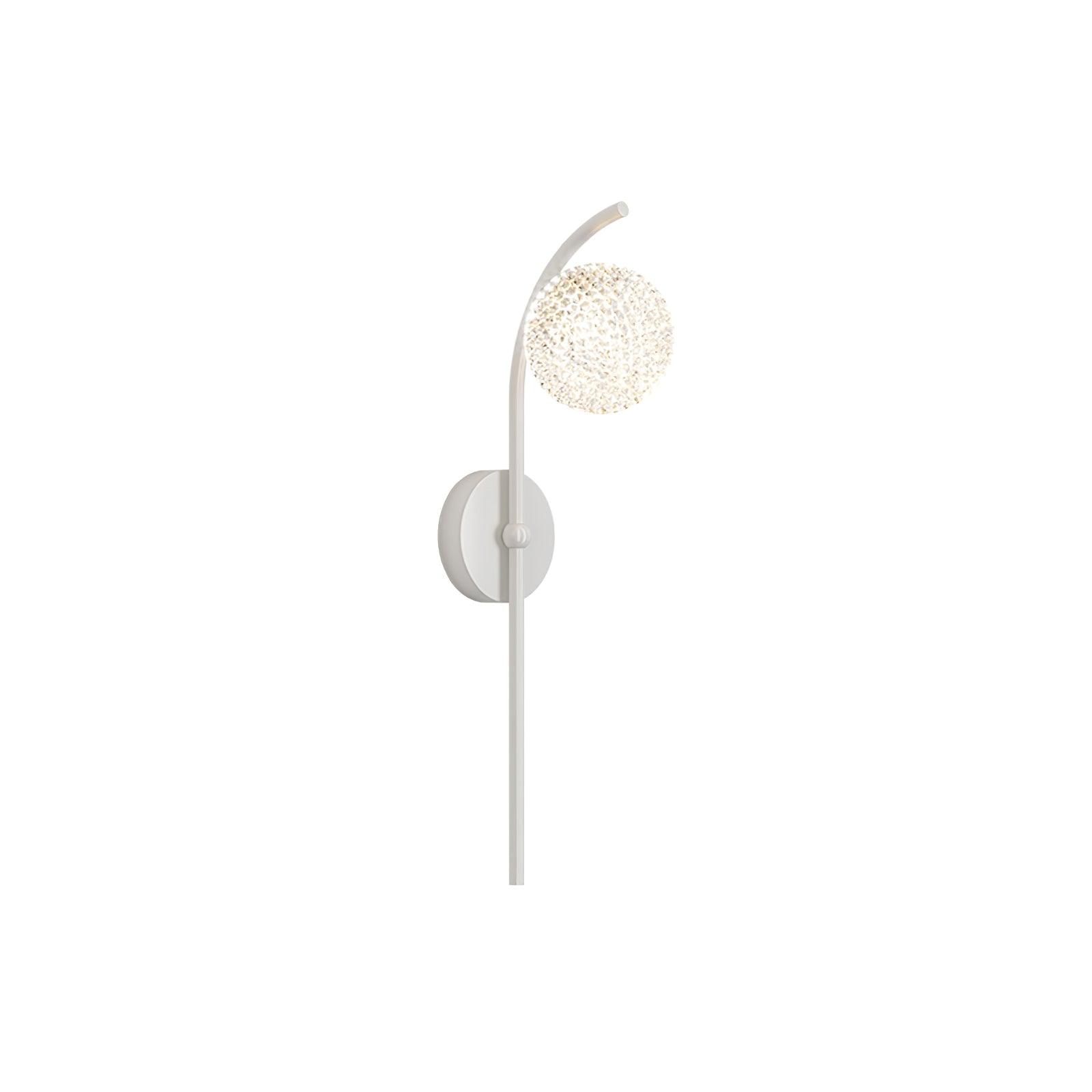 White Ksovv wall lamp with a curved stem, round wallplate and clear textured circular light head
