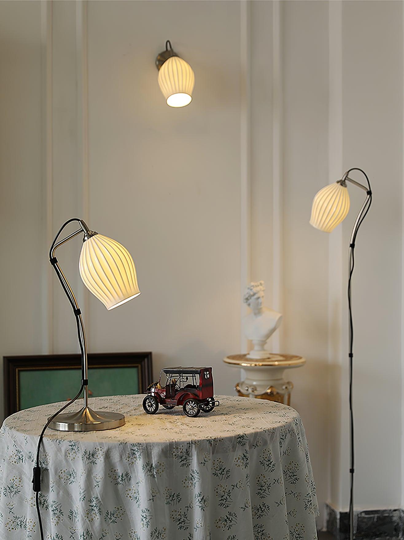 Gallery arrangement of ribbed wall, table and floor lights