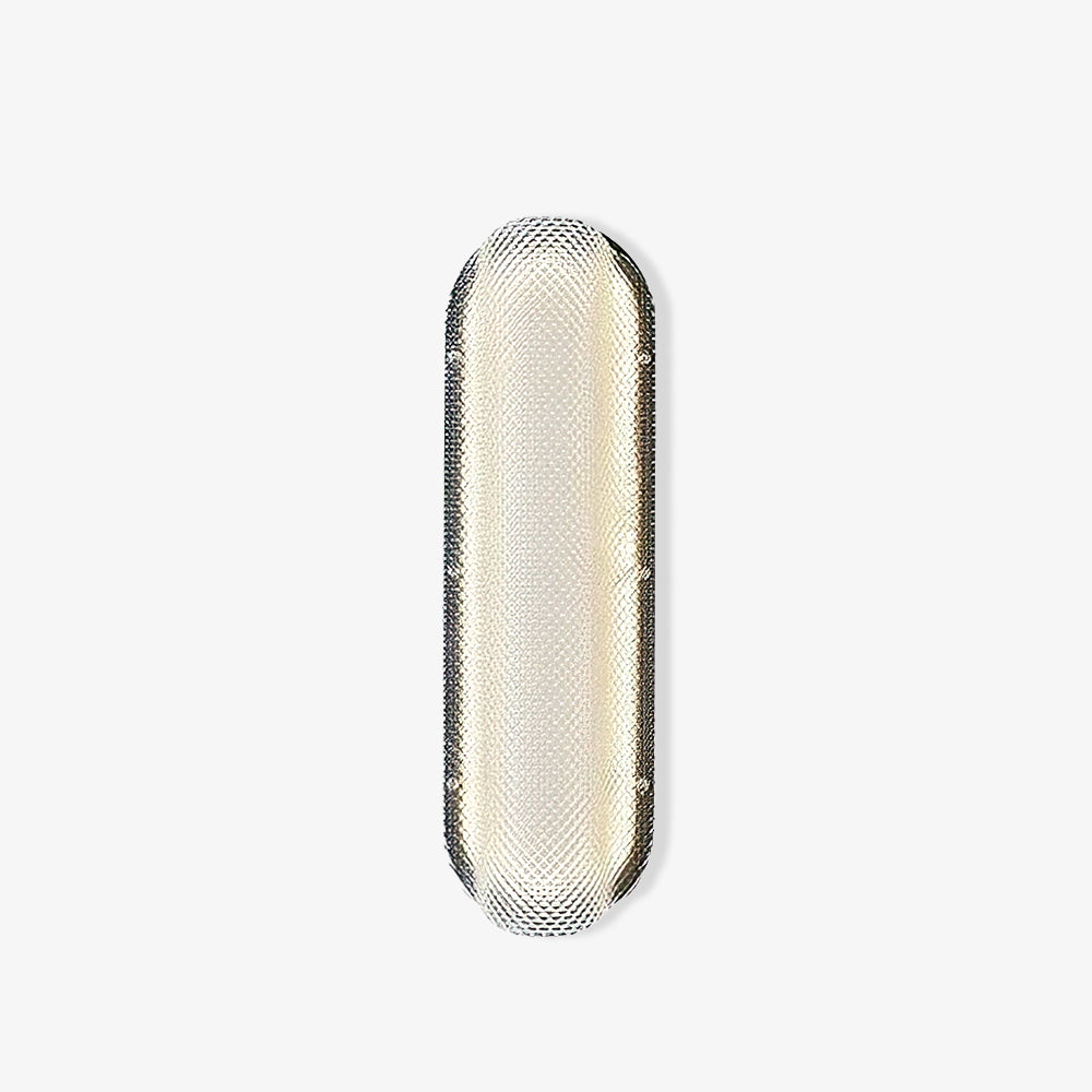 Opposite-angle isolated Vale wall light showing the rounded glass lens and black backing