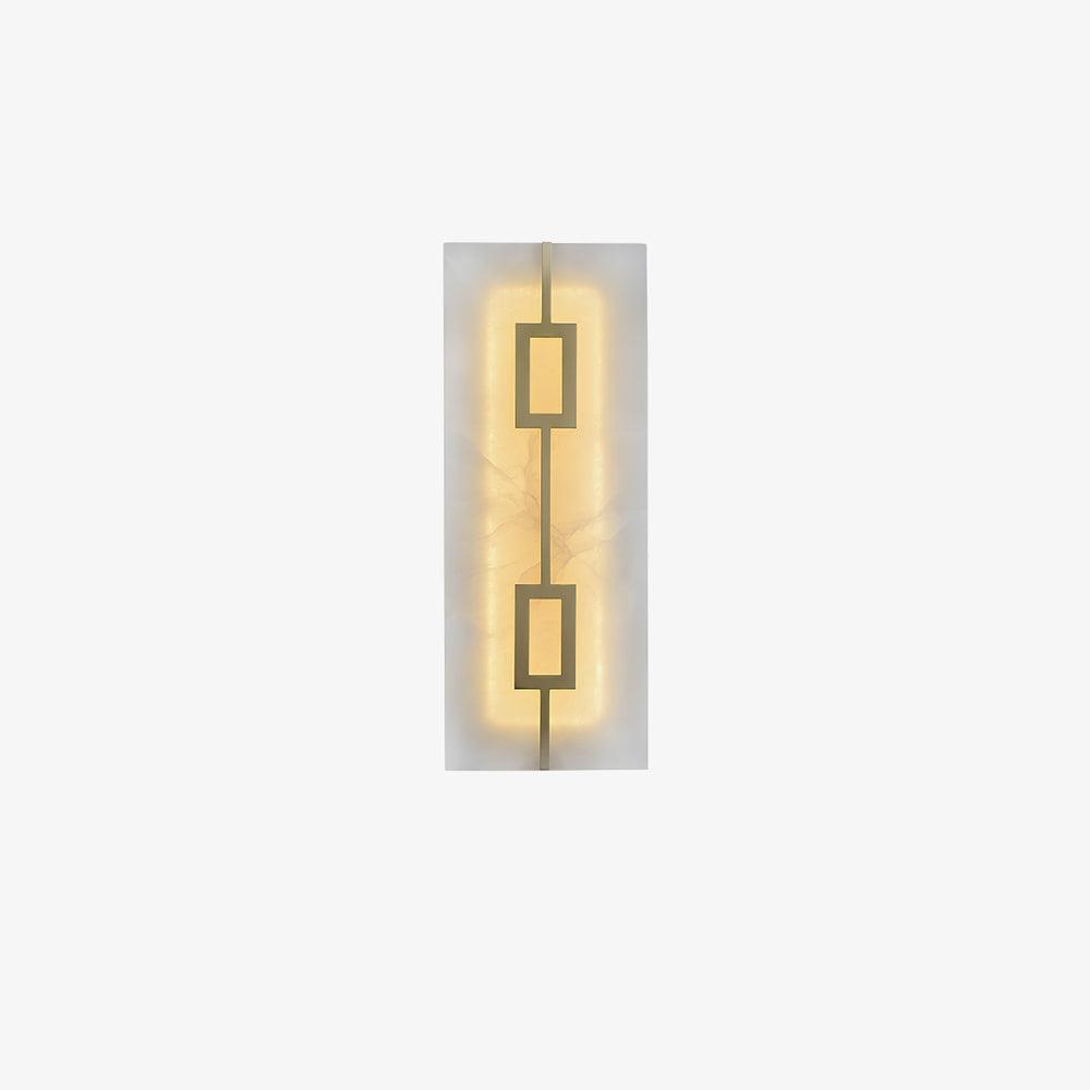 Small isolated tall stone-look wall light with two linked brass-tone rectangles and wide white margins