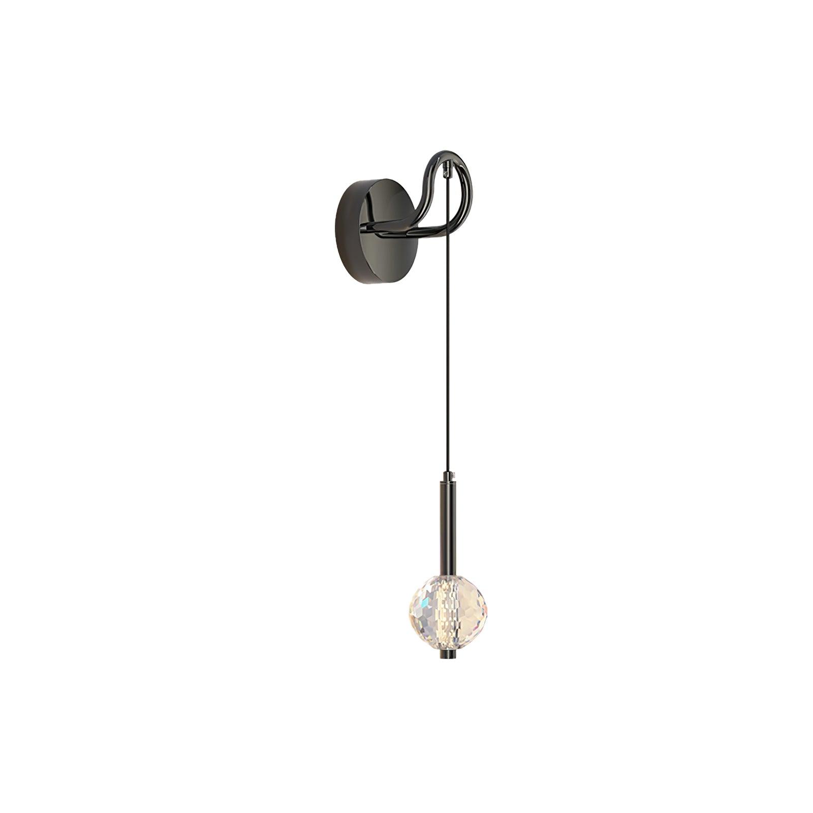 Large isolated wall light with round plate at left, curled arm and clear hanging globe on a dark cylindrical neck