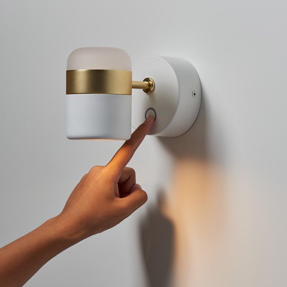 Adjustable cylindrical LED wall light