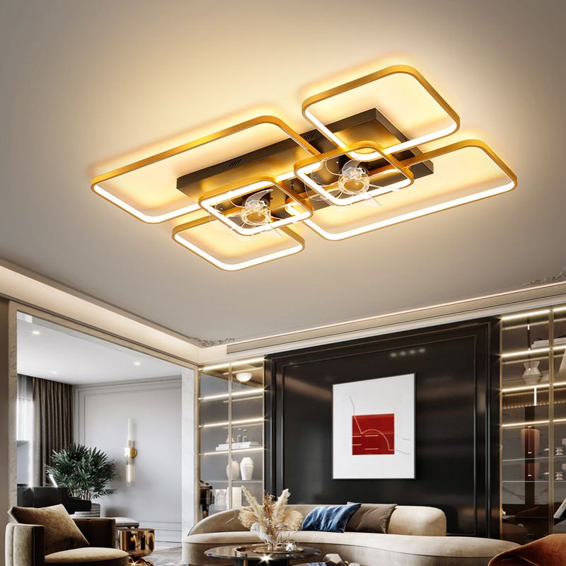 Gold-Black Lacey rectangular double-fan light illuminated in a living room