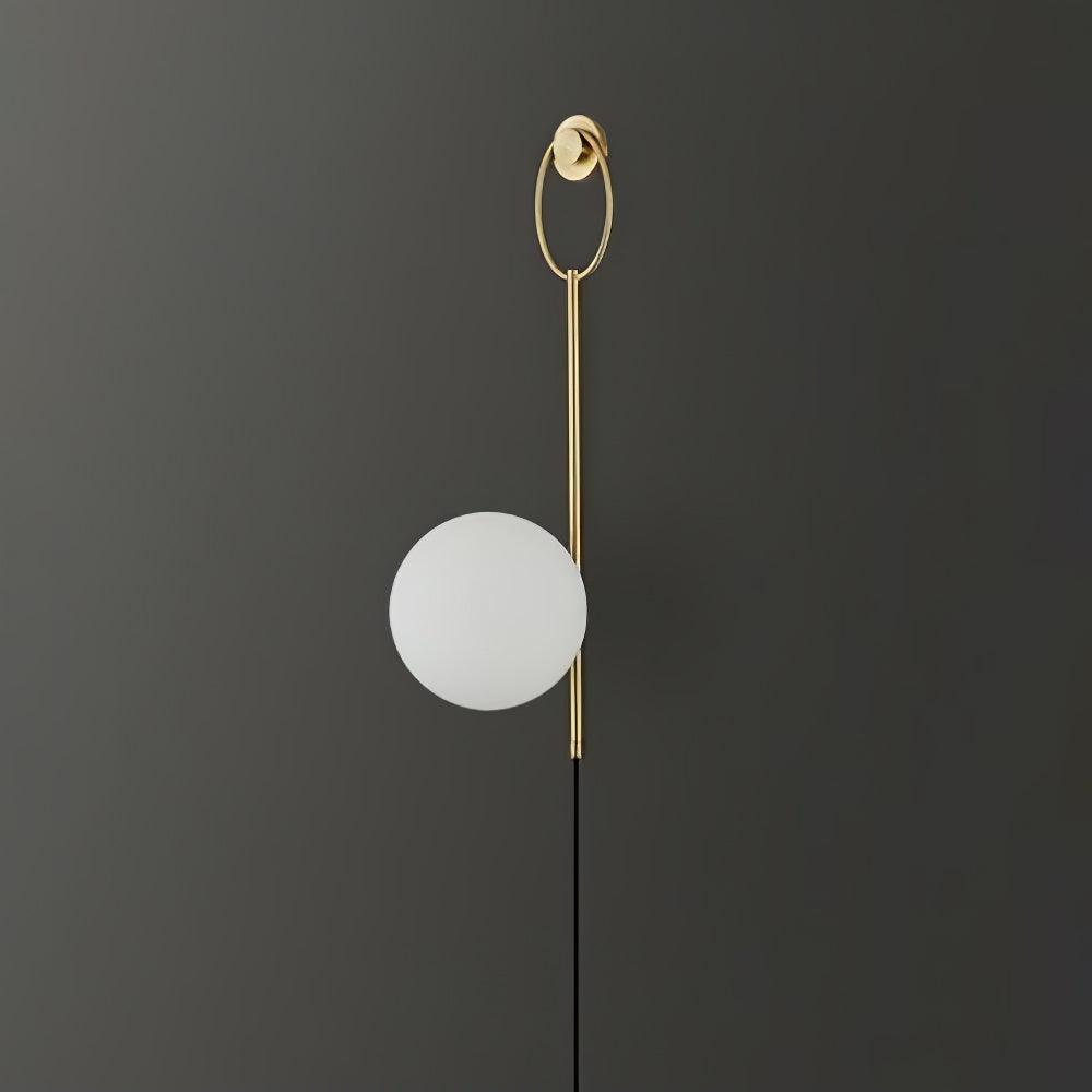 Unlit White globe on gold-toned stem with trailing cord