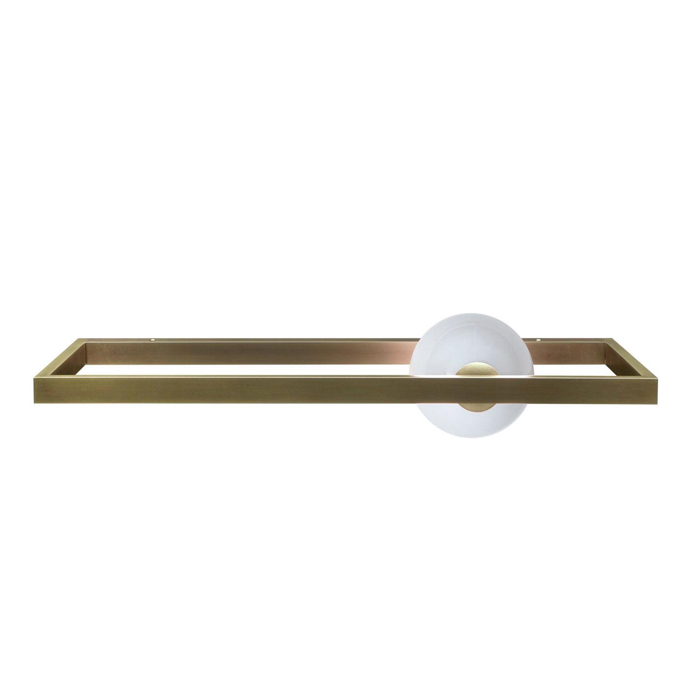 Copper-finish open rectangular wall light with a pale glass globe against white