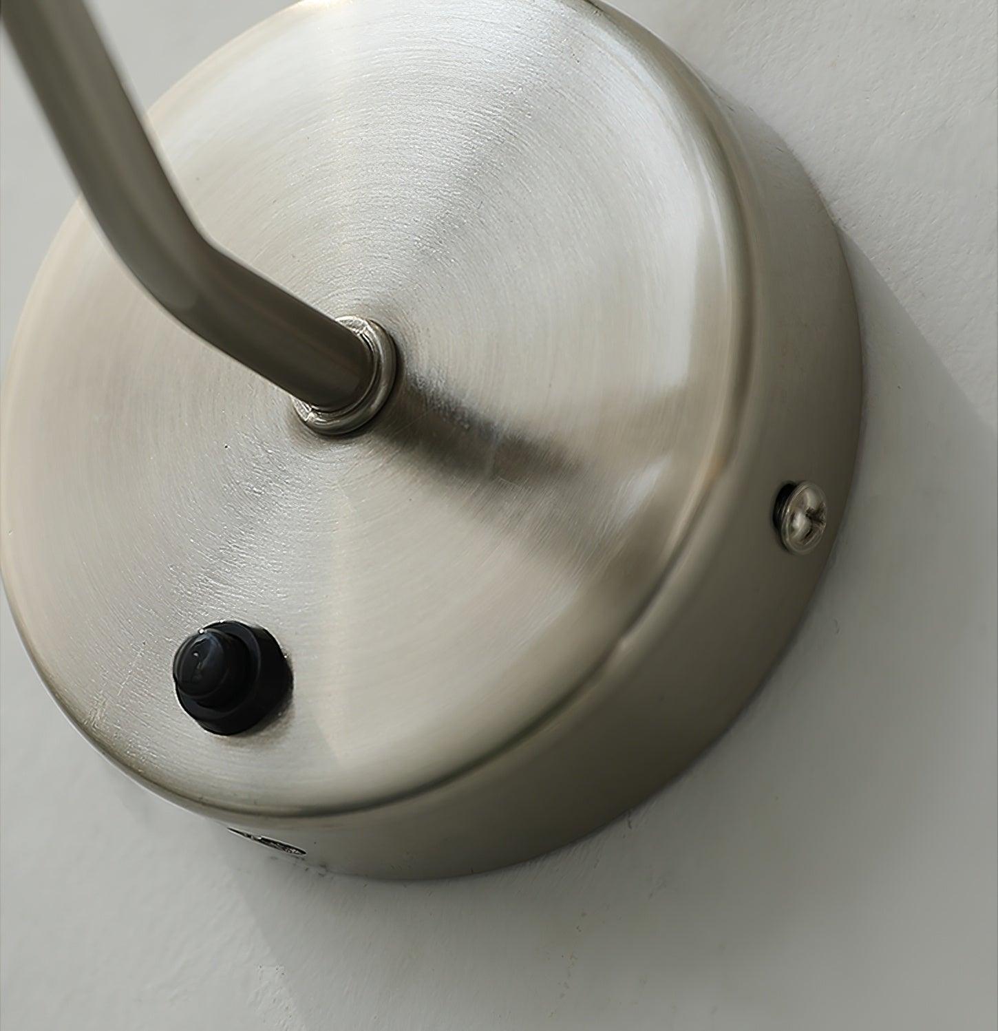 Sand-nickel backplate with black push button and edge screw
