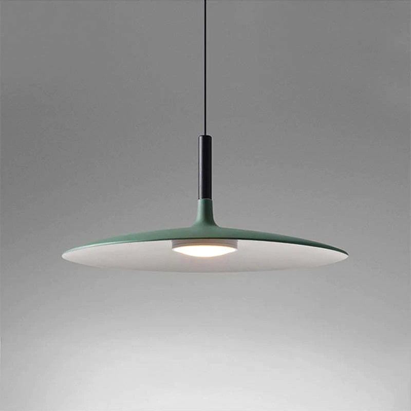 Close green shallow dome pendant with pale underside and a central glowing disc