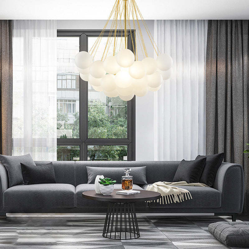 Gold 37-globe pendant in a living-room setting