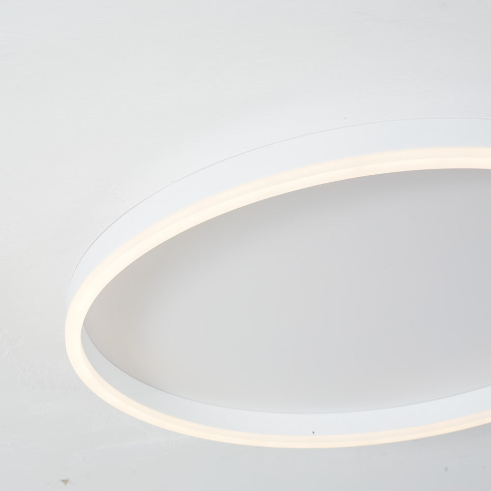 Oblique close-up of white Arisha’s upper and right arc, showing the open center and warm-looking light strip.