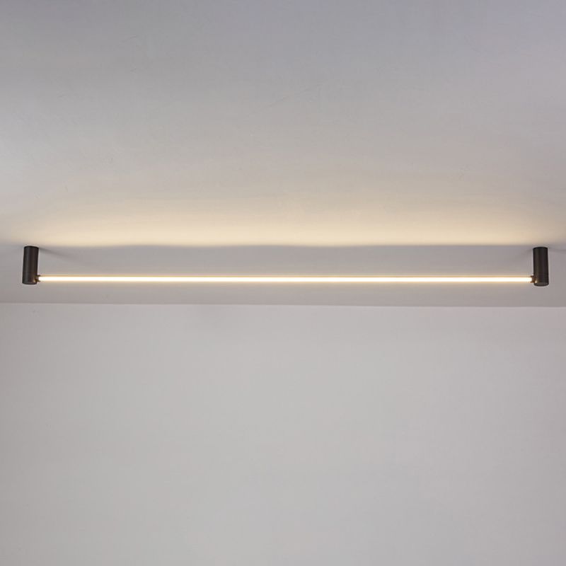 Front view of Edge near the ceiling, with black cylindrical ends, a bright narrow line and warm-looking surface wash.