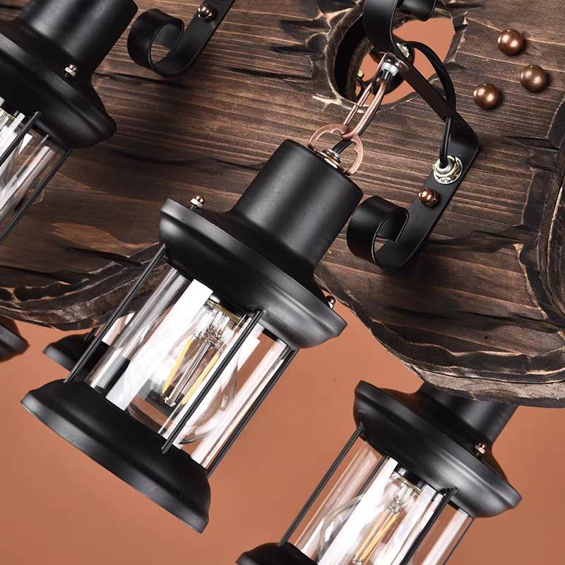 Close view of Austin black lantern frames, clear panels and exposed bulbs