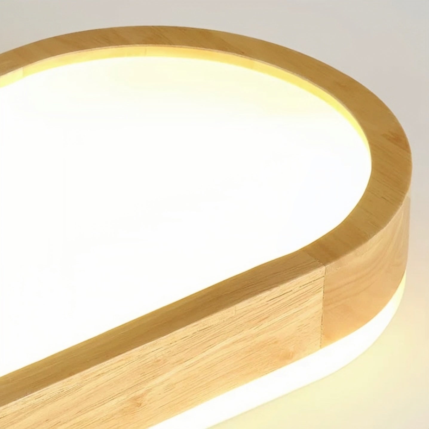 Close view of the Ozawa rounded wood edge and bright acrylic diffuser