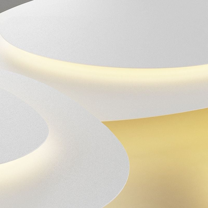 Valentina detail of overlapping white curved sections and a narrow glowing channel with a warm halo between the forms.