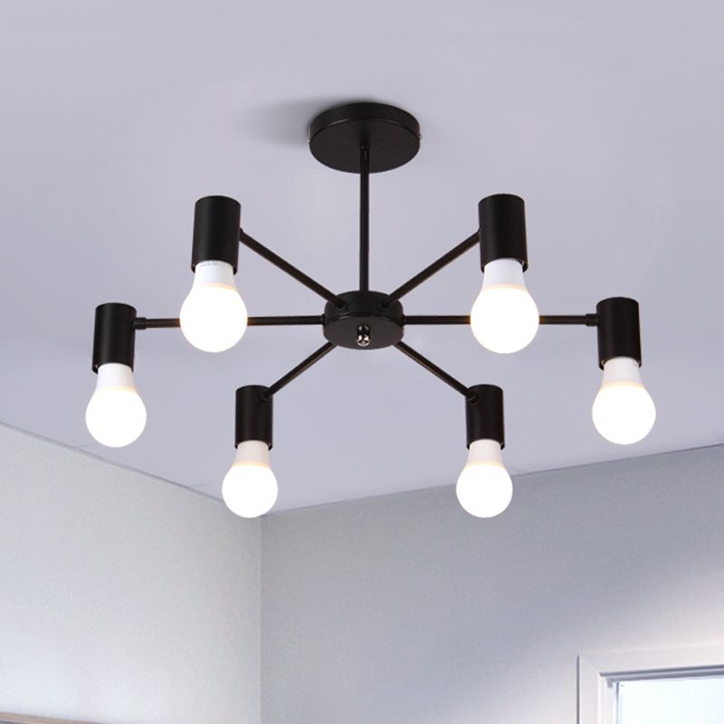 Close view of black six-light ceiling fixture with short post, round canopy, straight arms and exposed bulbs