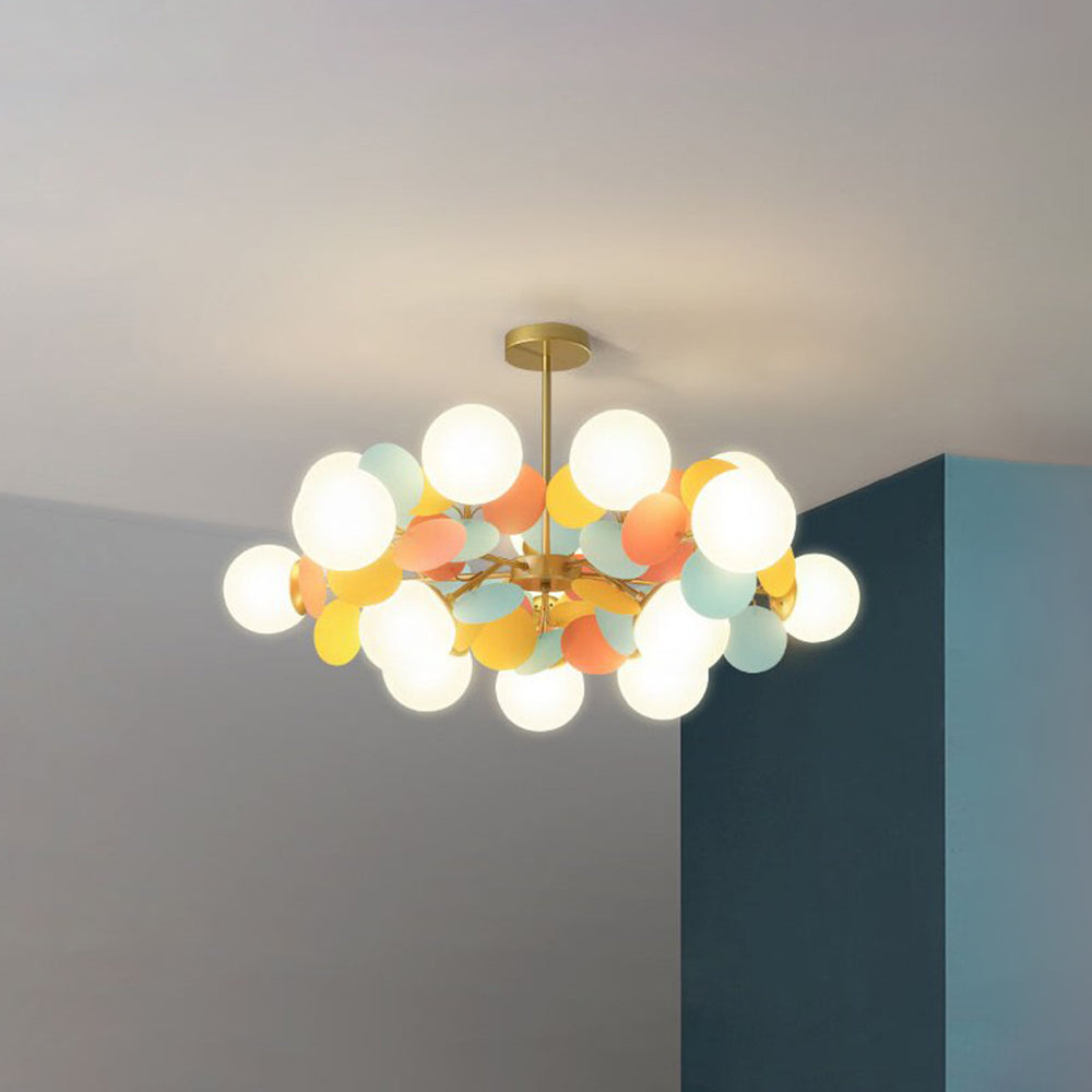 Jevon Color 35.4-inch 15-light option showing a broad cluster of white globes and yellow, coral and teal petals.