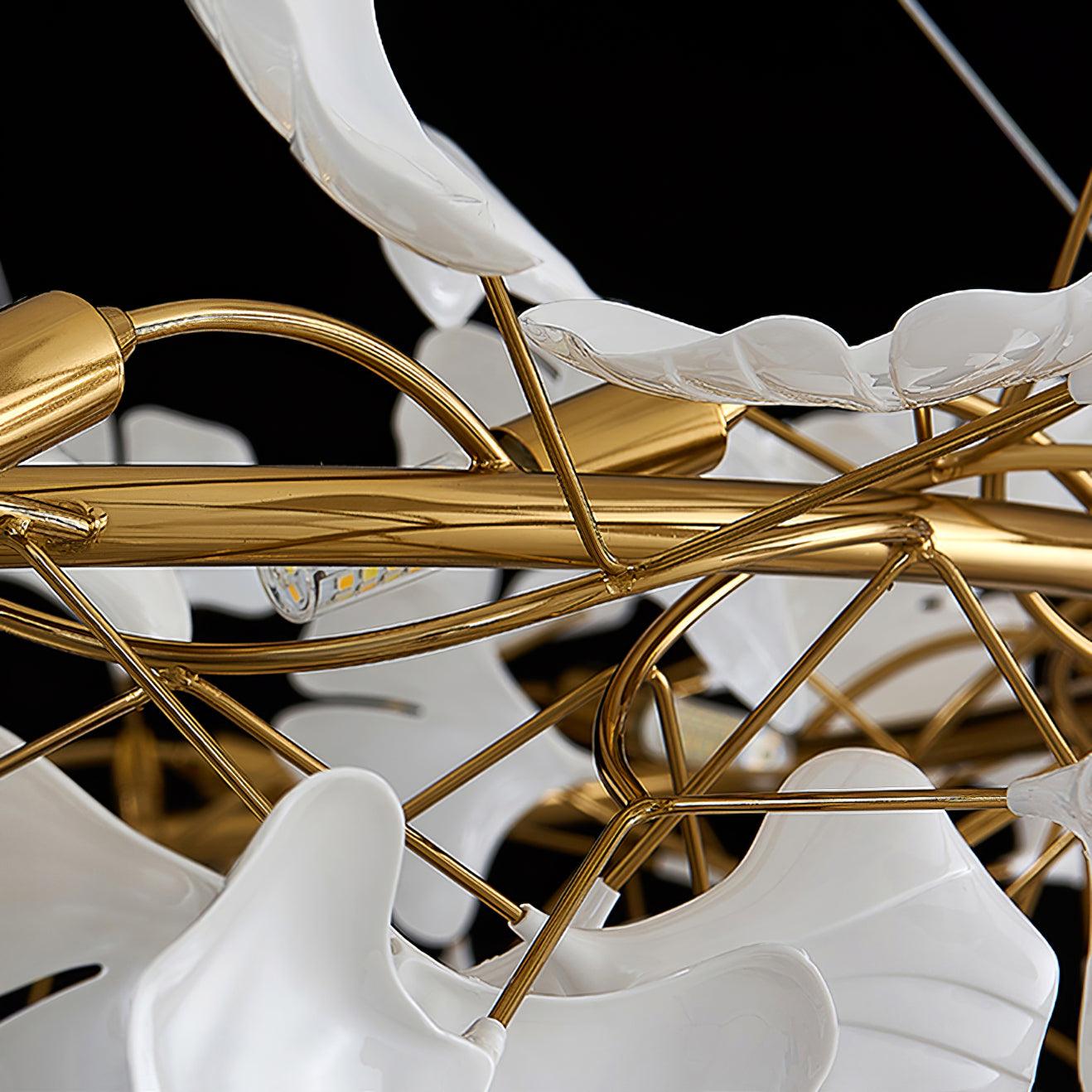 White ceramic leaves attached to intertwined gold-colour branches
