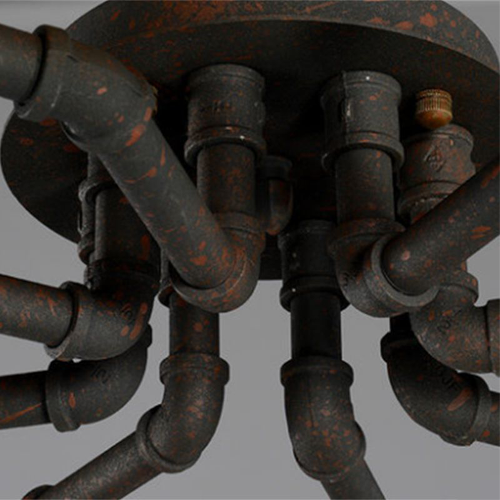 Close view of Alessio ceiling canopy and clustered pipe connections