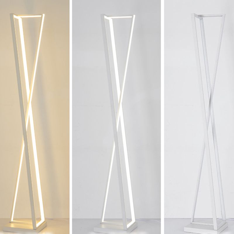Three-panel view of a white crossed-triangle floor lamp with warm-looking light, whiter light and an unlit-looking frame