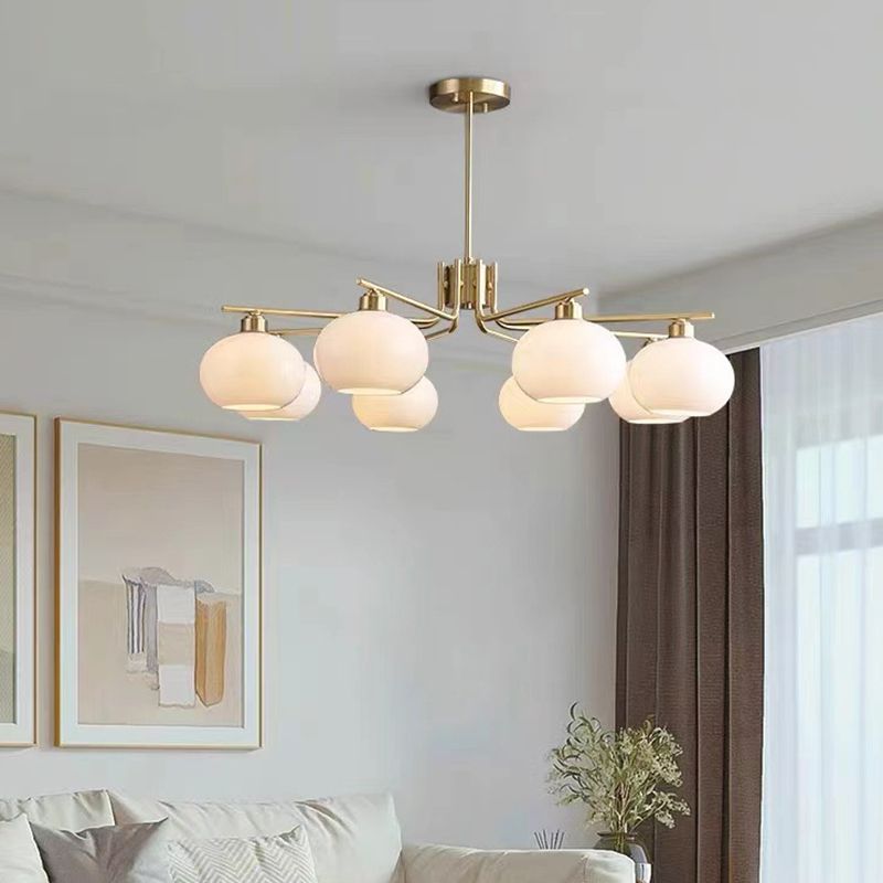 Valentina eight-light brass-finish chandelier with white glass shades