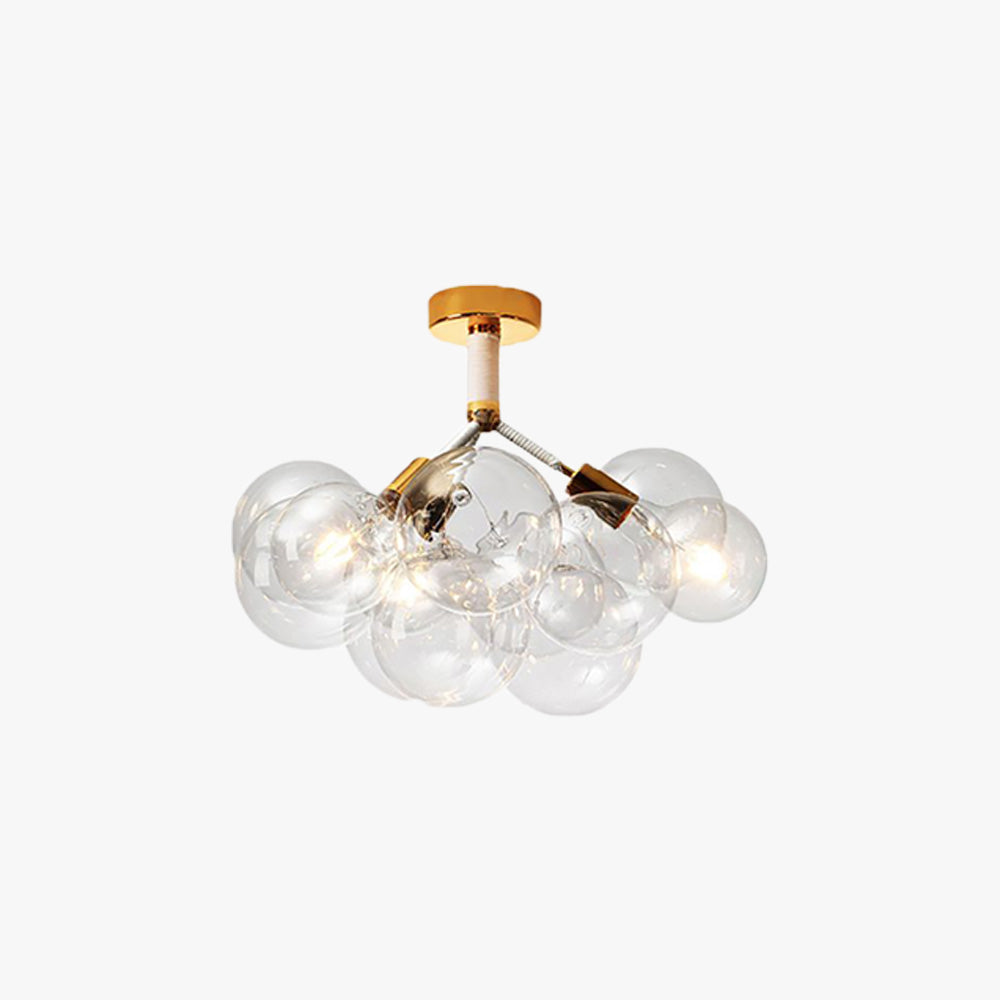 Gold-tone three-light clear globe ceiling fixture on white, with illuminated bulbs and white-wrapped supports