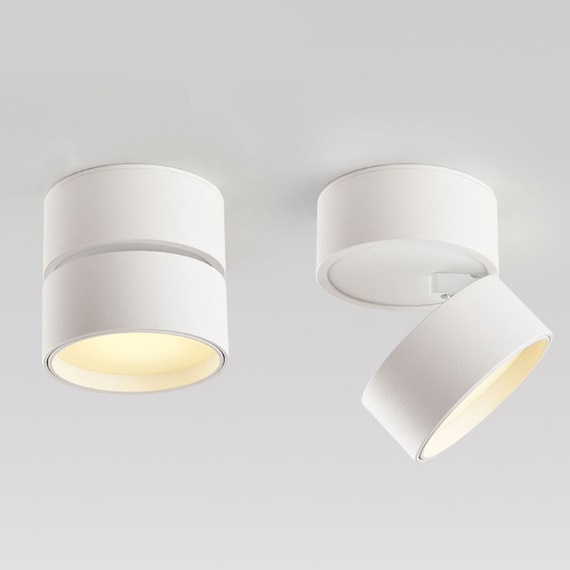 Two white Novak positions on white: one head aligned with its base, the other tilted at the hinge.