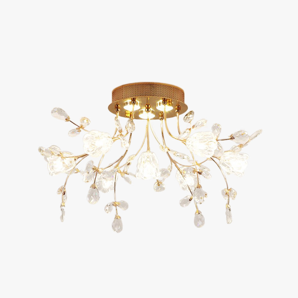 Isolated compact Lili floral fixture with a perforated round canopy, clear flower shades and leaf-shaped drops on gold-tone branches.